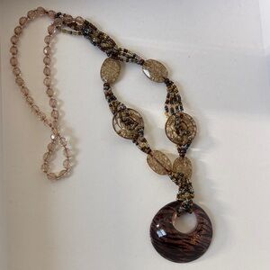 Elegant Beaded Necklace with Brown Pendant